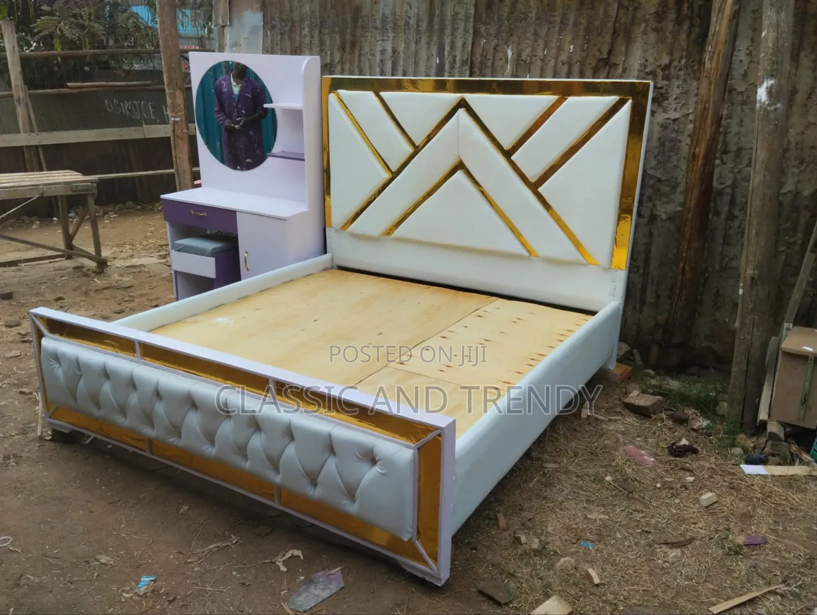 White Upholstered Bed With Gold Trims 5x6