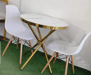 Modern Elegance: Oval Marble Gold Bistro Dining Set