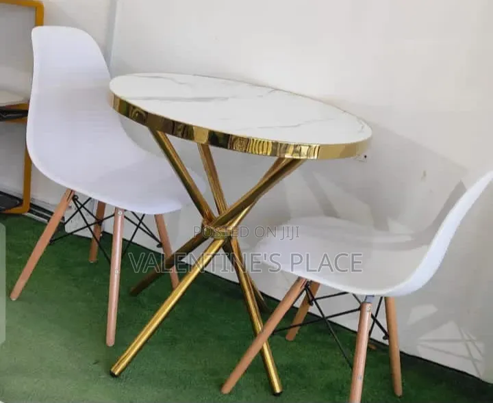 Modern Elegance: Oval Marble Gold Bistro Dining Set