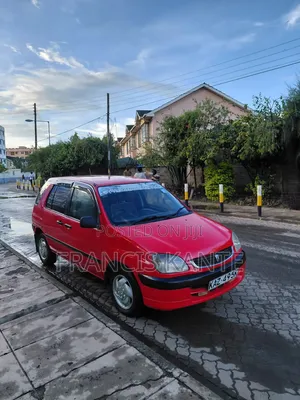 Toyota Raum 2001 Red