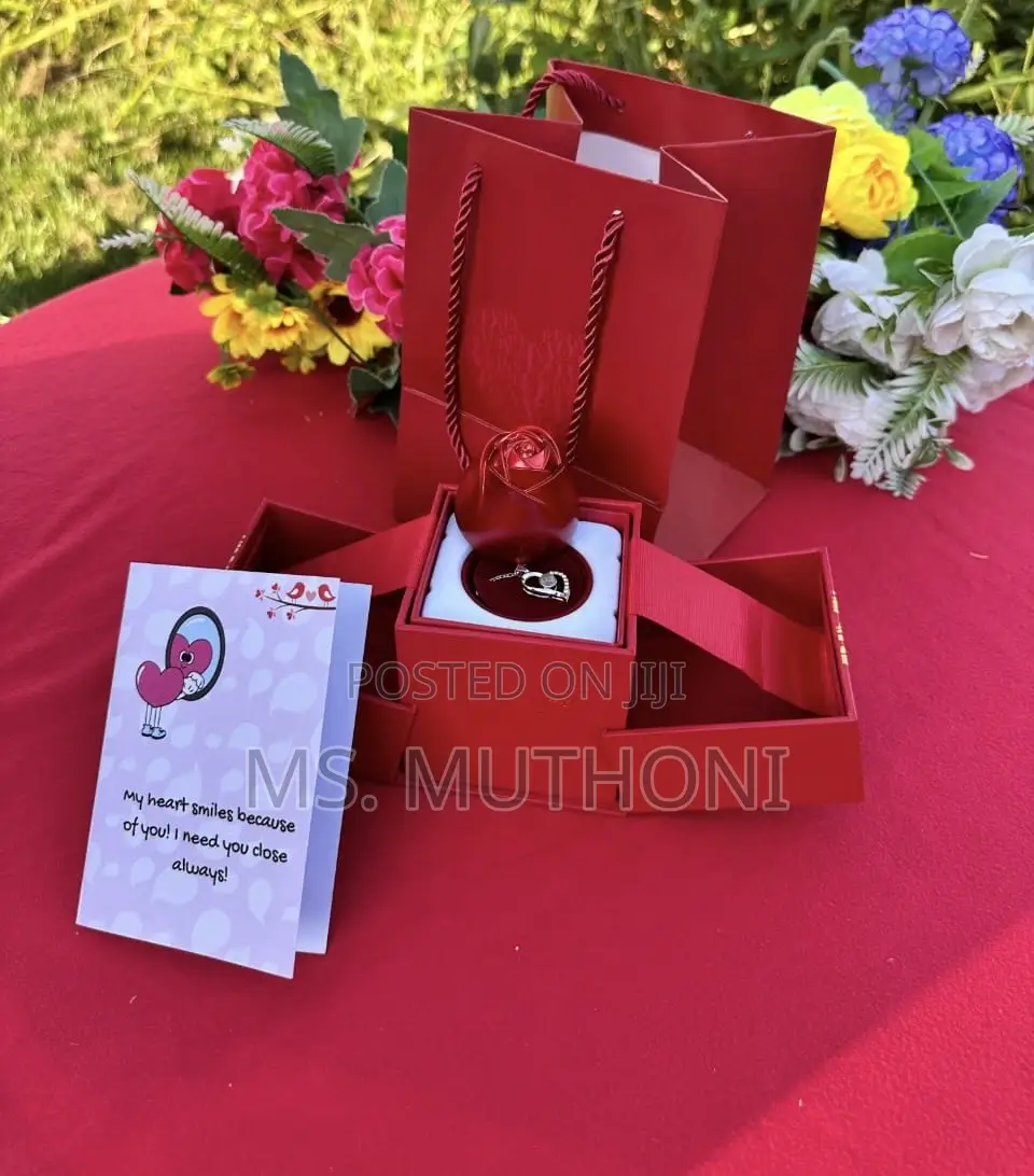 An "I Love You in 100 Languages" Rotating Rose Jewelry Gift Box Set.