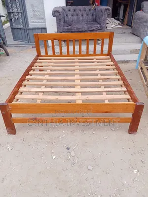 5 by 6 Hardwood Bed Used