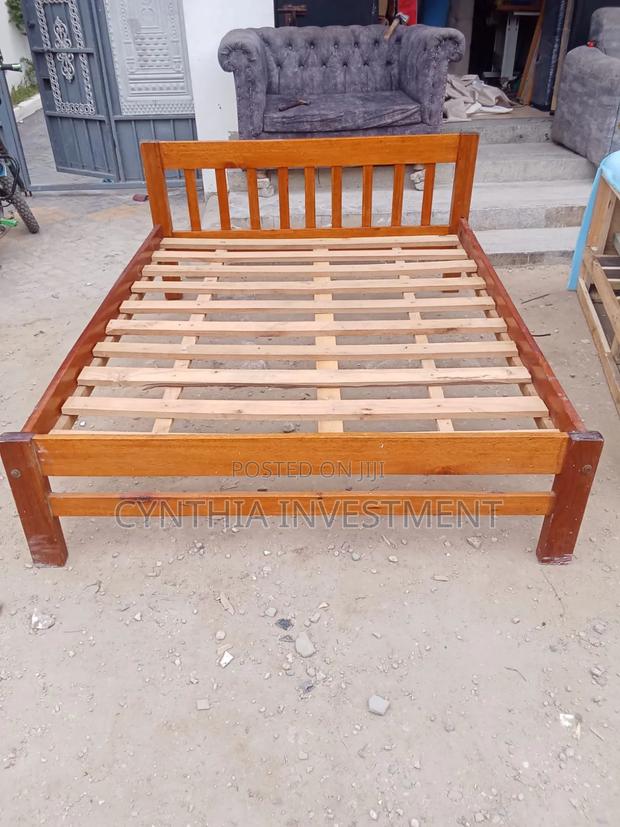 5 by 6 Hardwood Bed Used