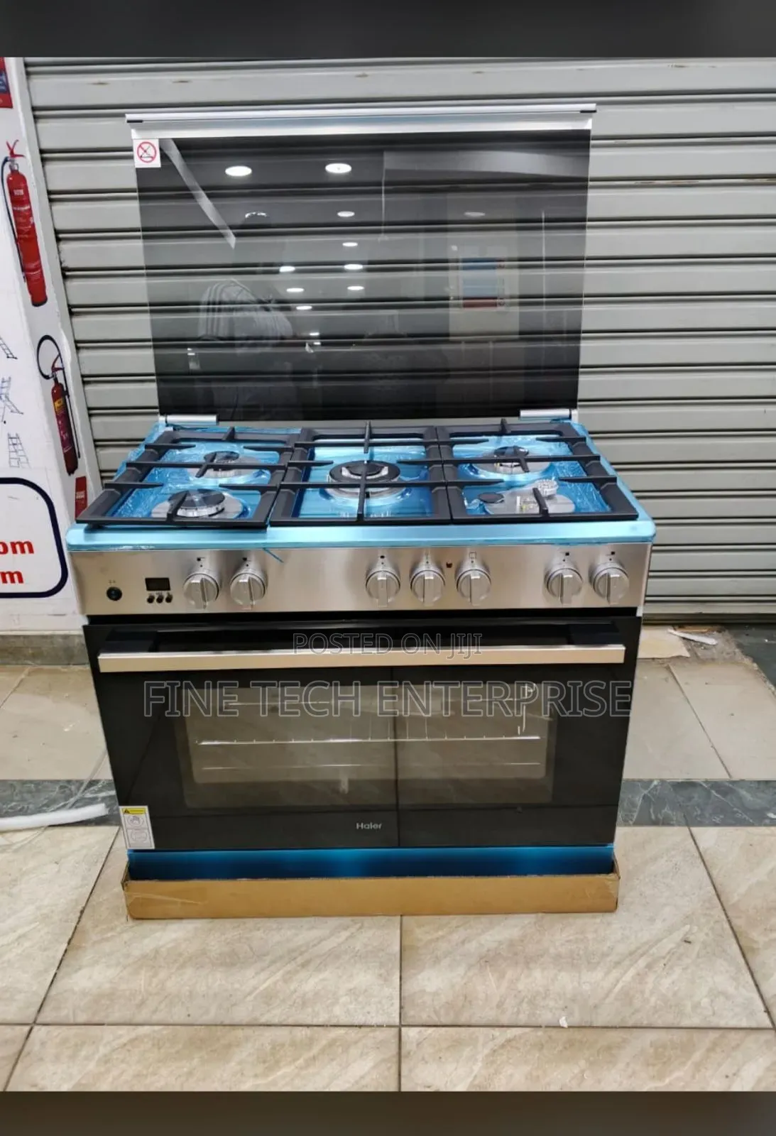 Haier 60*90 5gas Standing Cooker With Electric Oven and Wok Burner.