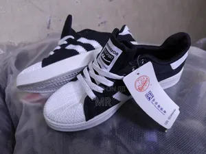 Cream Convers $ Rubber Shoes