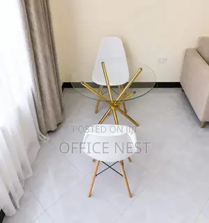Modern Round Glass Dining Table Set With White Eames Chairs