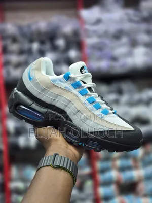 Nike Air Max 95 Sneakers in a "Laser Blue" or "Blue Spark" Colorway.