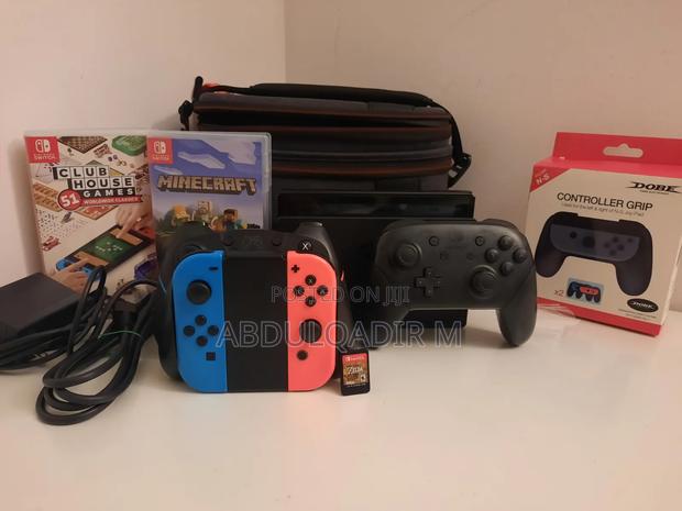 Nintendo Switch With Games and Controllers - main view