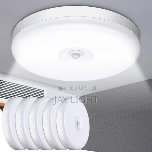 Motion Sensor Eyes Ceiling Light White LED Bulkhead - main view