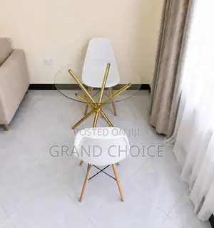 Modern Round Glass Dining Table Set With White Eames Chairs