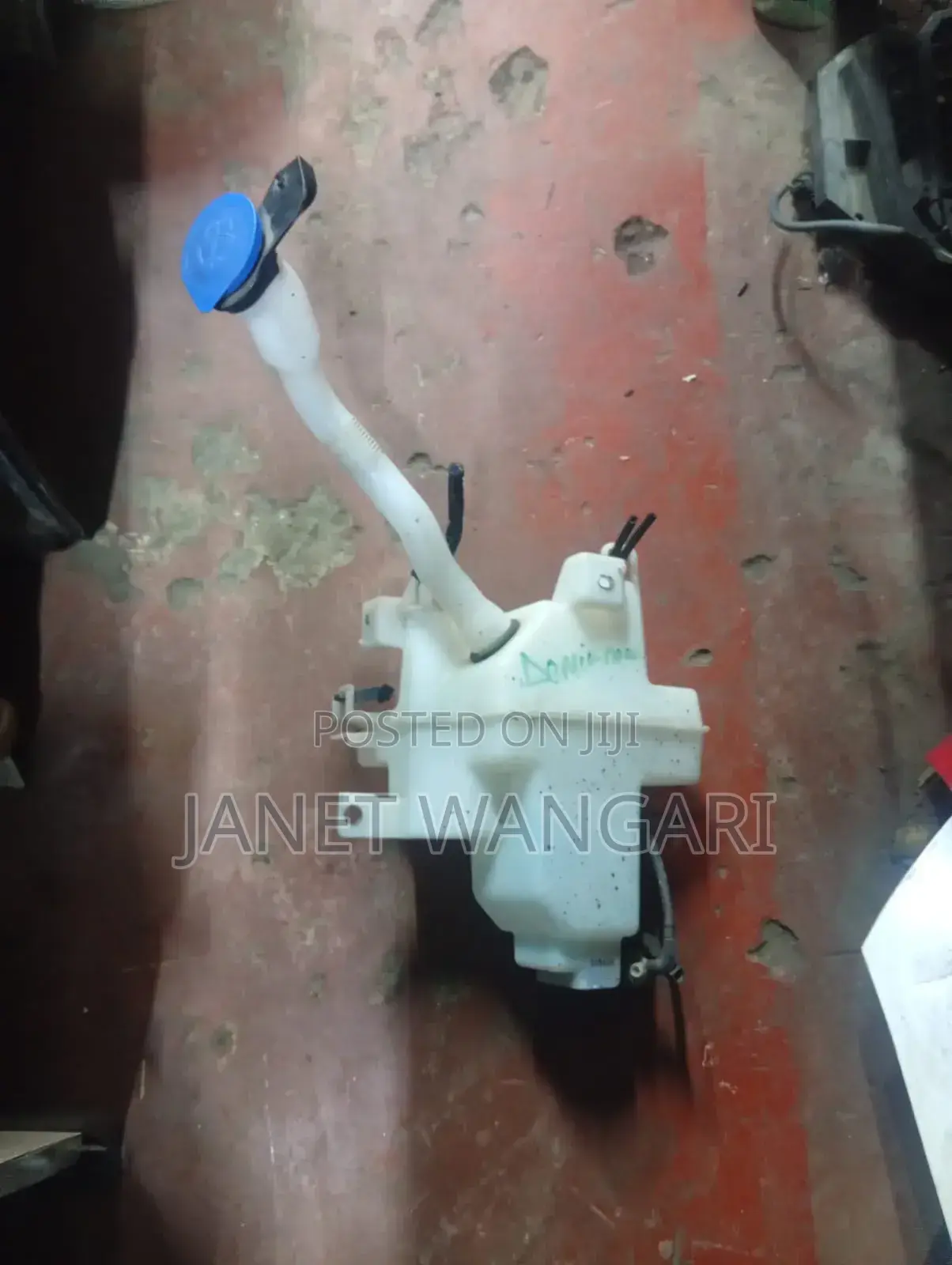 Washerbottle/Washertank Mazda Demio New Model