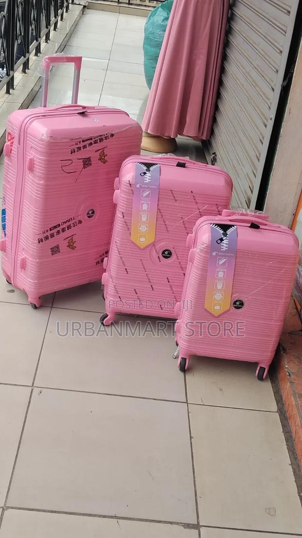 Large 3 Piece Rubber Suitcase Set With 360° Spinner Wheels - thumbnail 2