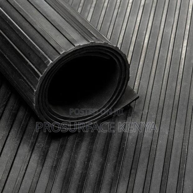 Heavy-Duty Ribbed Rubber Mat –