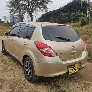 Nissan Tiida 2010 Yellow