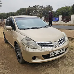 Nissan Tiida 2010 Yellow