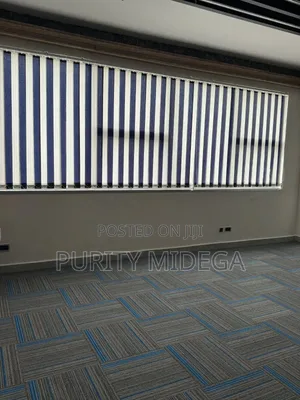 Blinds and Blue Square Shaped Carpet Tiles