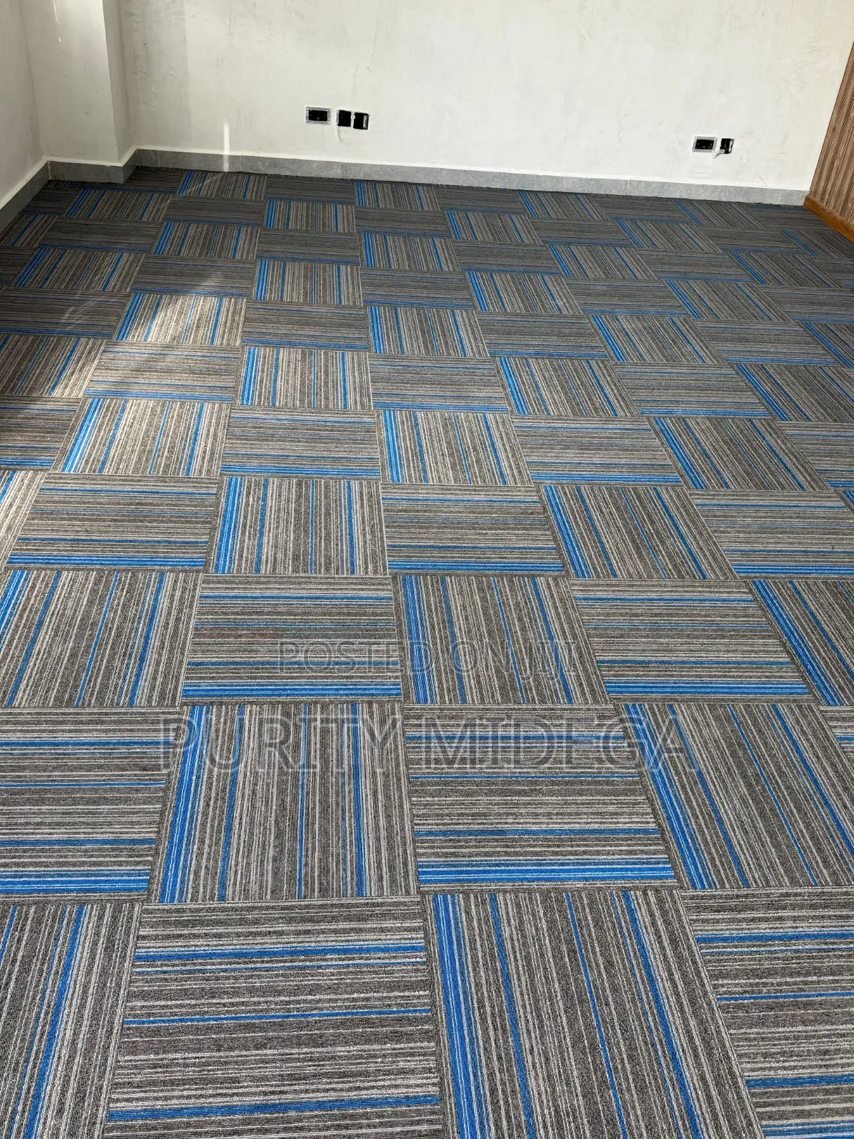 Blinds and Blue Square Shaped Carpet Tiles
