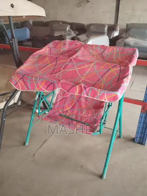 Kids Outdoor Double Swing Chair With a Sun Canopy.