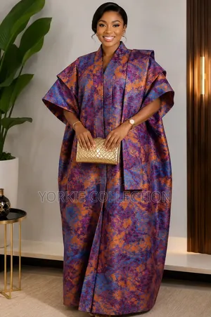 It’s a Traditional African Kaftan-Style Dress/Agbada-Style Gown.