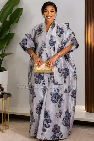 It’s a Traditional African Kaftan-Style Dress/Agbada-Style Gown.