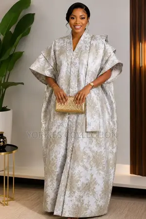 It’s a Traditional African Kaftan-Style Dress/Agbada-Style Gown.
