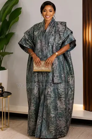 It’s a Traditional African Kaftan-Style Dress/Agbada-Style Gown.