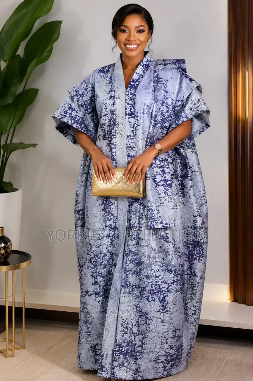 It’s a Traditional African Kaftan-Style Dress/Agbada-Style Gown.