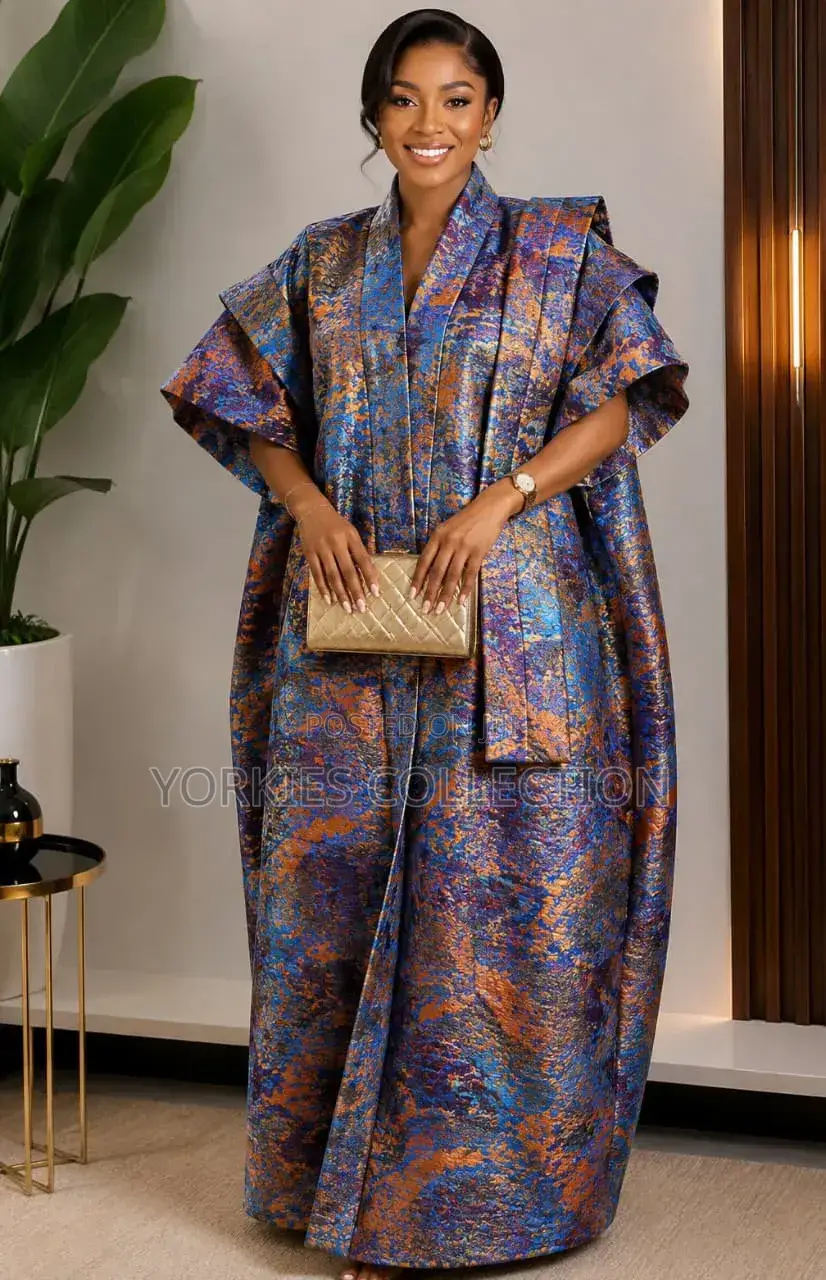 It’s a Traditional African Kaftan-Style Dress/Agbada-Style Gown.