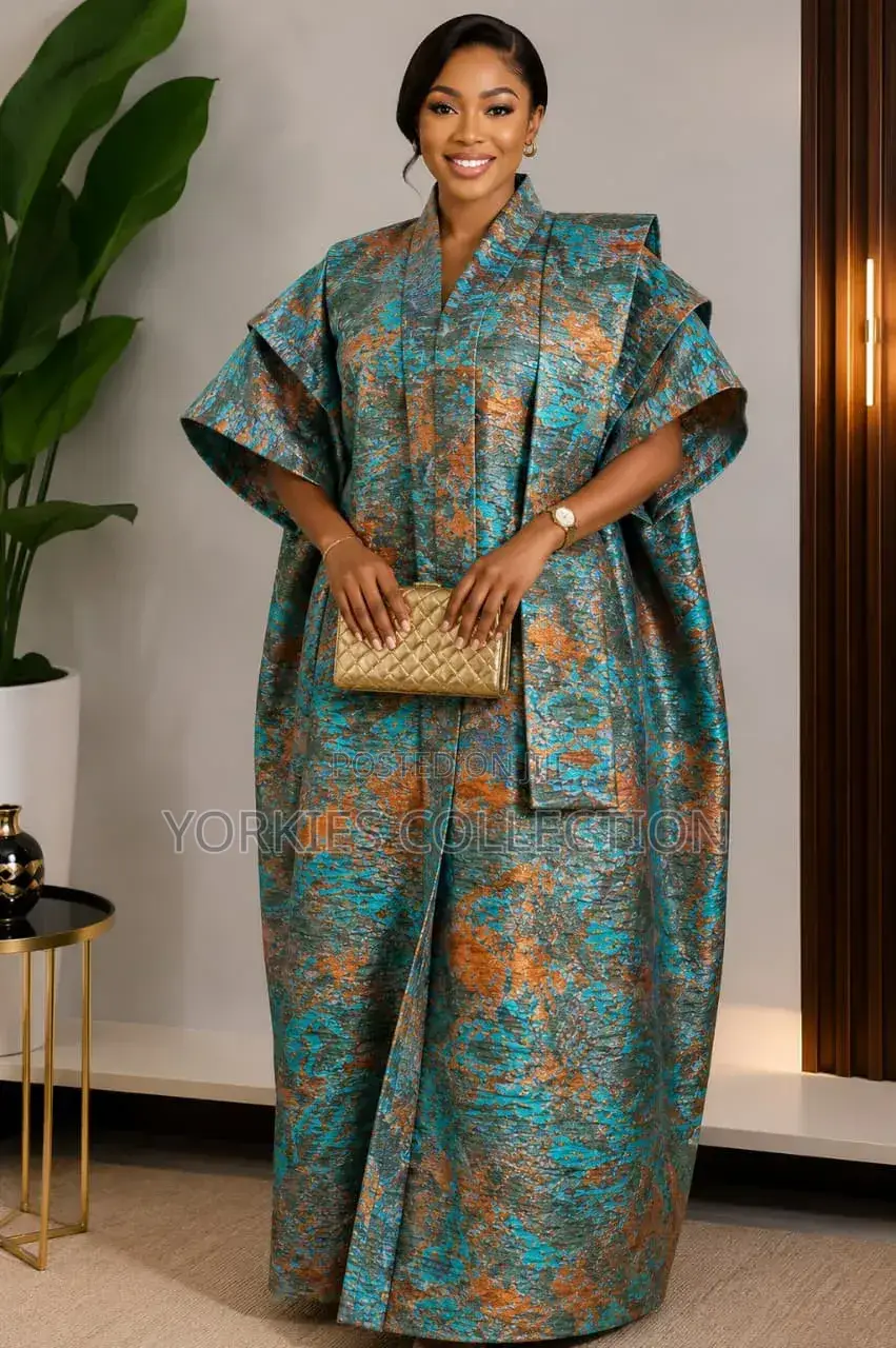 It’s a Traditional African Kaftan-Style Dress/Agbada-Style Gown.