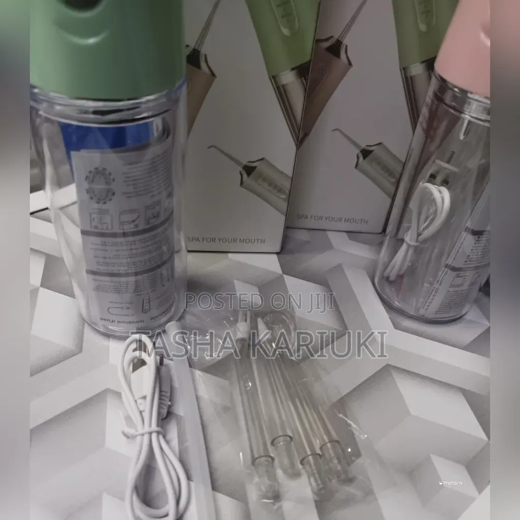 Oral Care Irrigator With 4 Nozzles