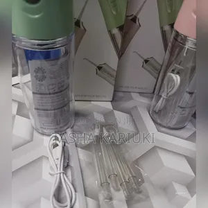 Oral Care Irrigator With 4 Nozzles