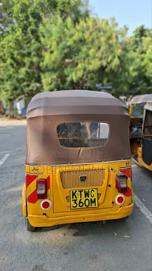 Bajaj RE 2024 Yellow