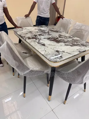 This Is a Classic Marble-Top Dining Set With 6 Leather Chairs,