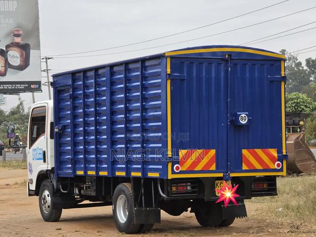 Isuzu NMR Cover Body 2008 White - thumbnail 6
