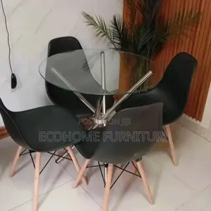 4 Seater Glass Dining Table Round Is Shaped