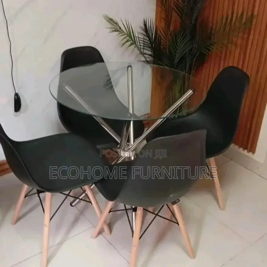 4 Seater Glass Dining Table Round Is Shaped
