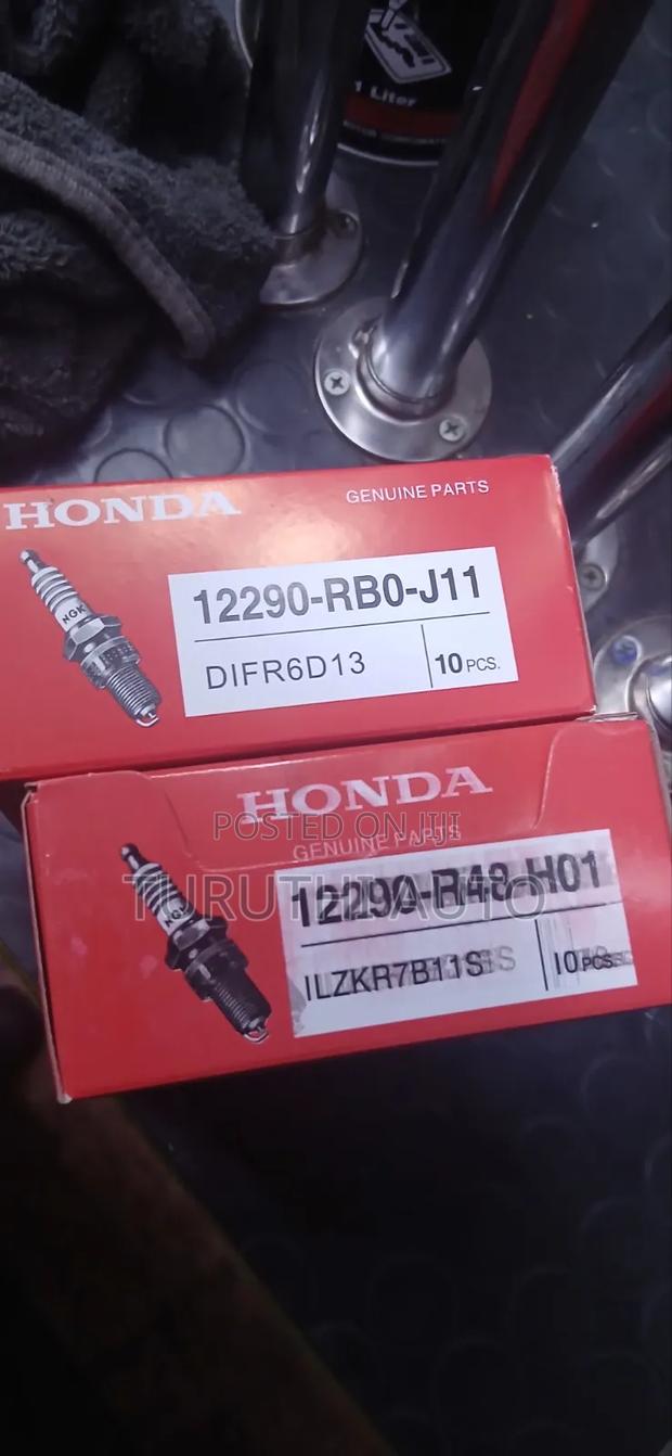 Honda Genuine Spark Plugs Size 16 and 14 - main view