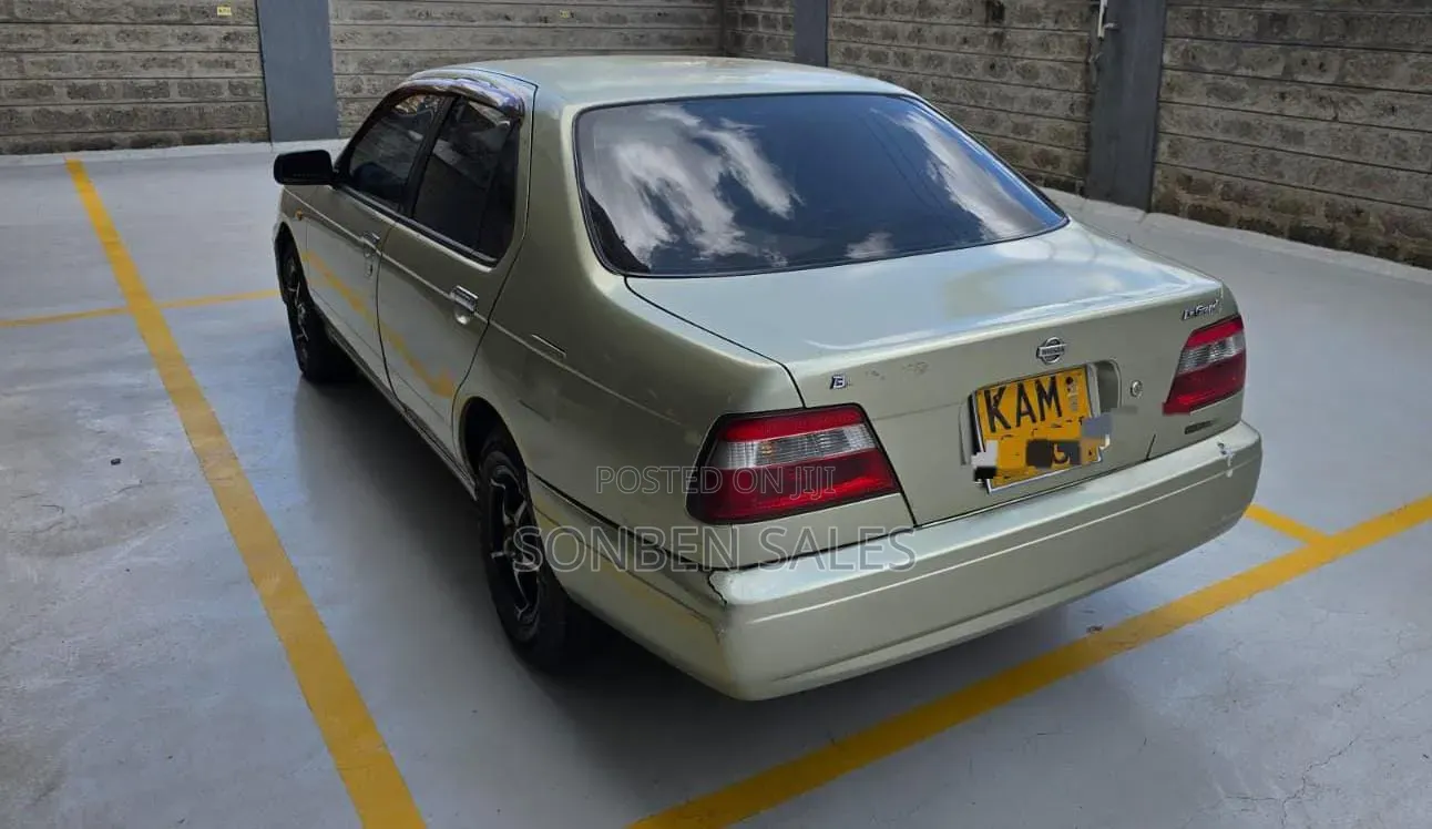 Nissan FB14 1998 Gold
