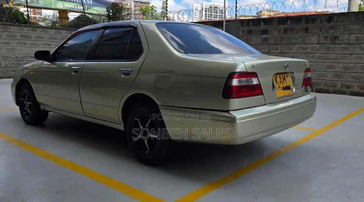Nissan FB14 1998 Gold