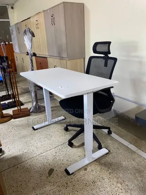 Electric Desk . 1.4m by 0.6m Adjustable Height