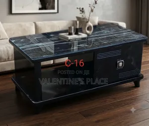 Modern Black Coffee Table Featuring a Sleek Marble