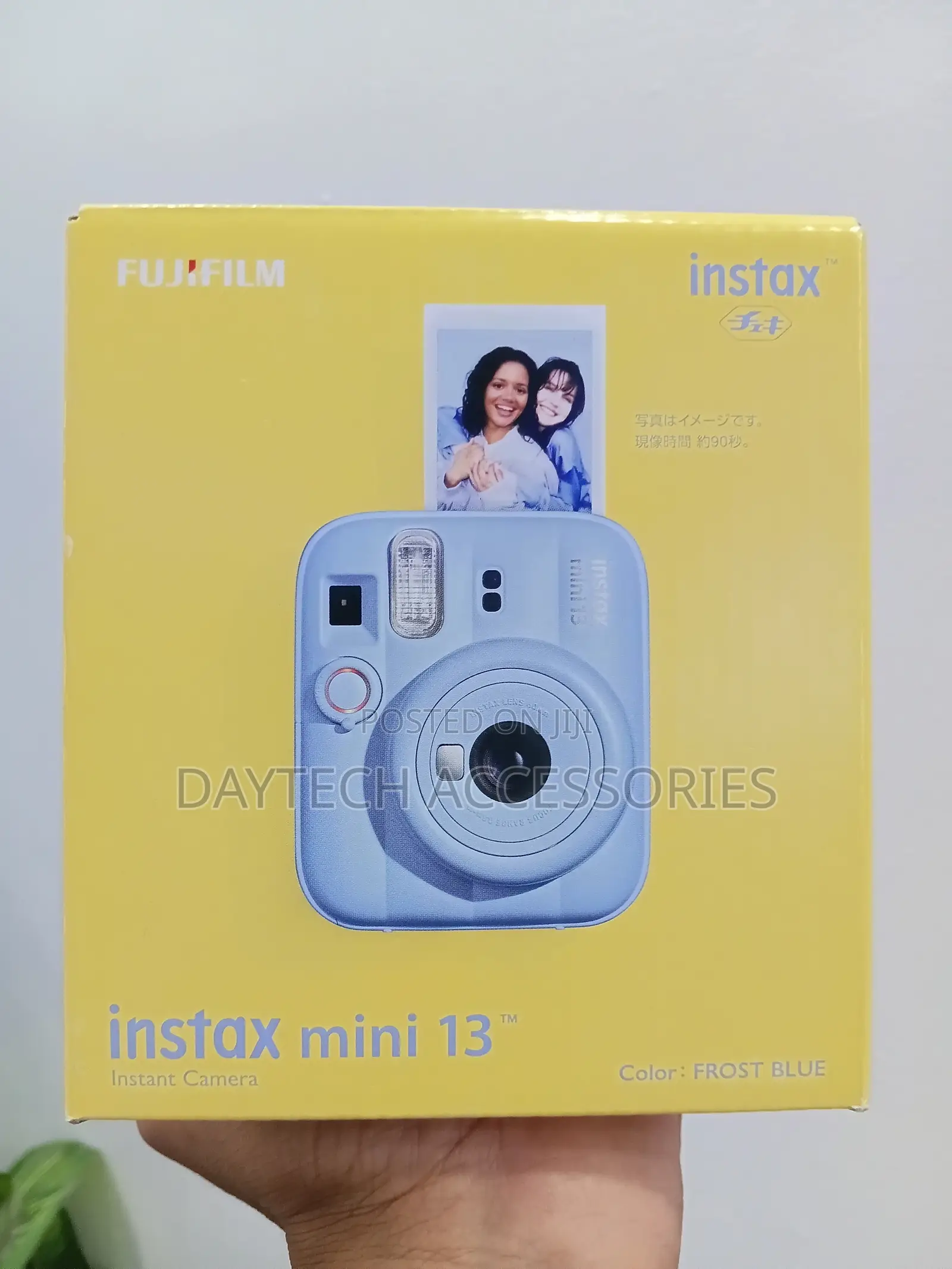 Fujifilm INSTAX Mini 13 Instant Camera in the Frost Blue Color.