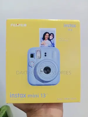 Fujifilm INSTAX Mini 13 Instant Camera in the Frost Blue Color.