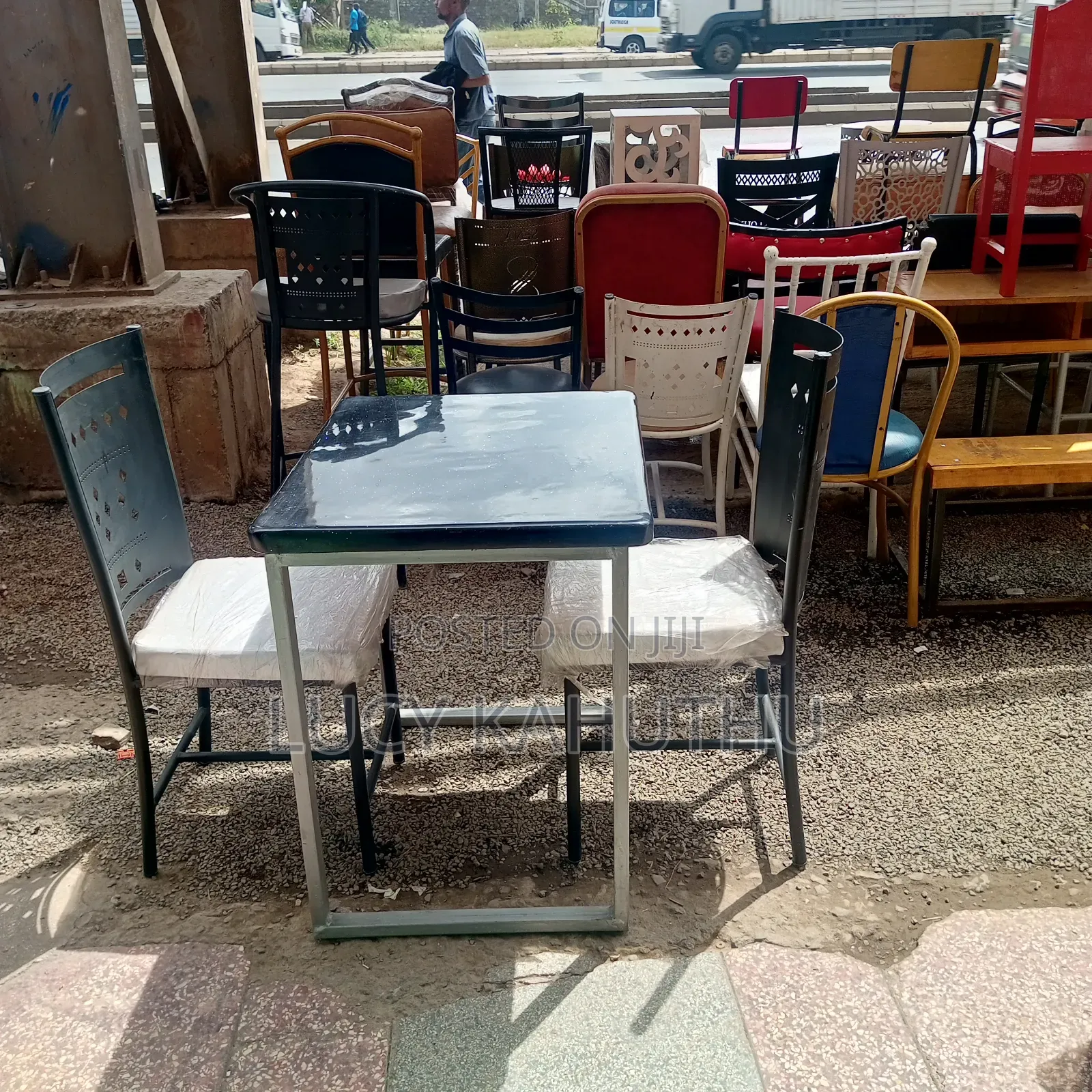 Grey Marble Top With Mabati Laser Cut Chairs