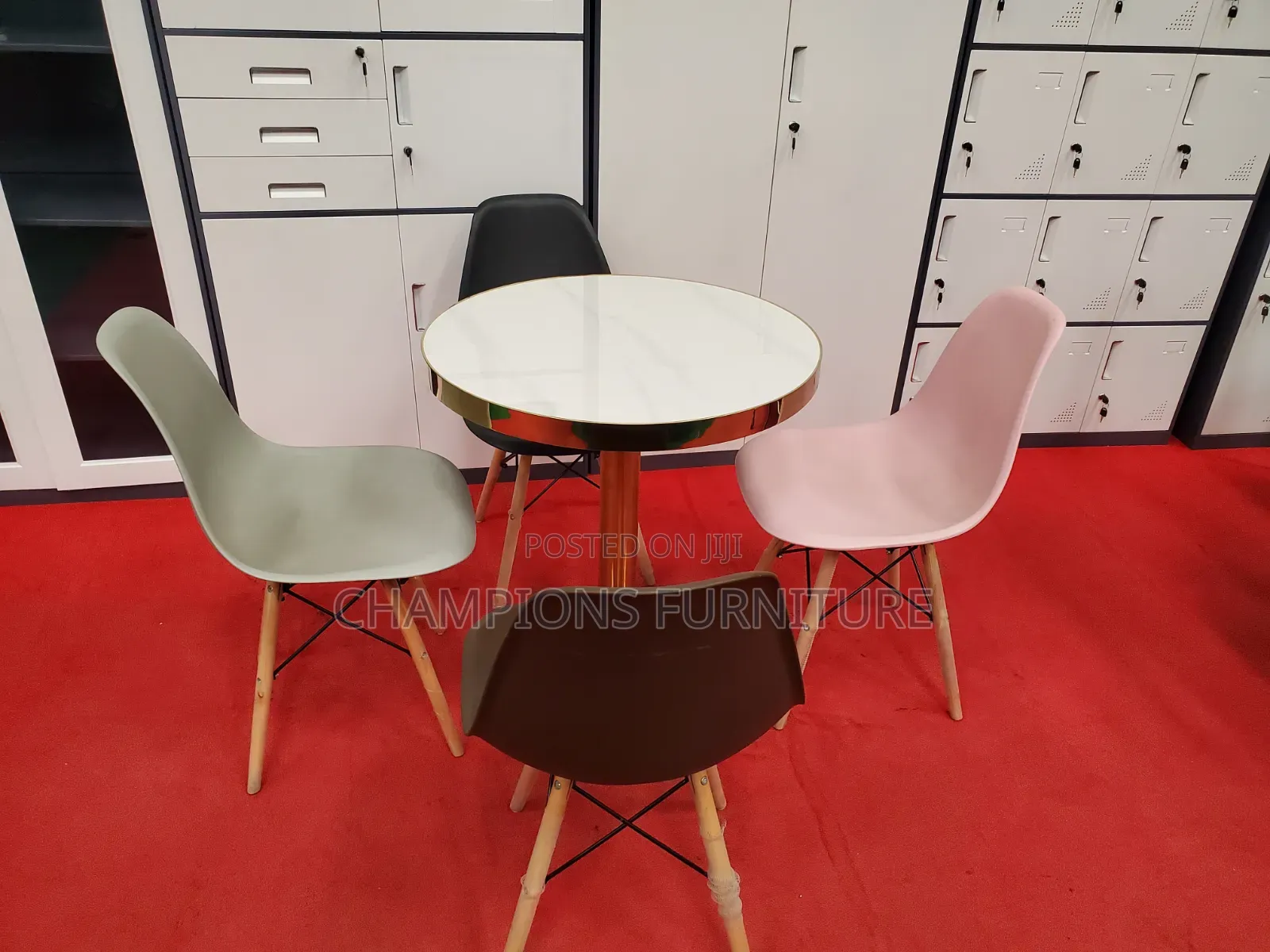 Gold Pedestal Table and Eames Chairs Set