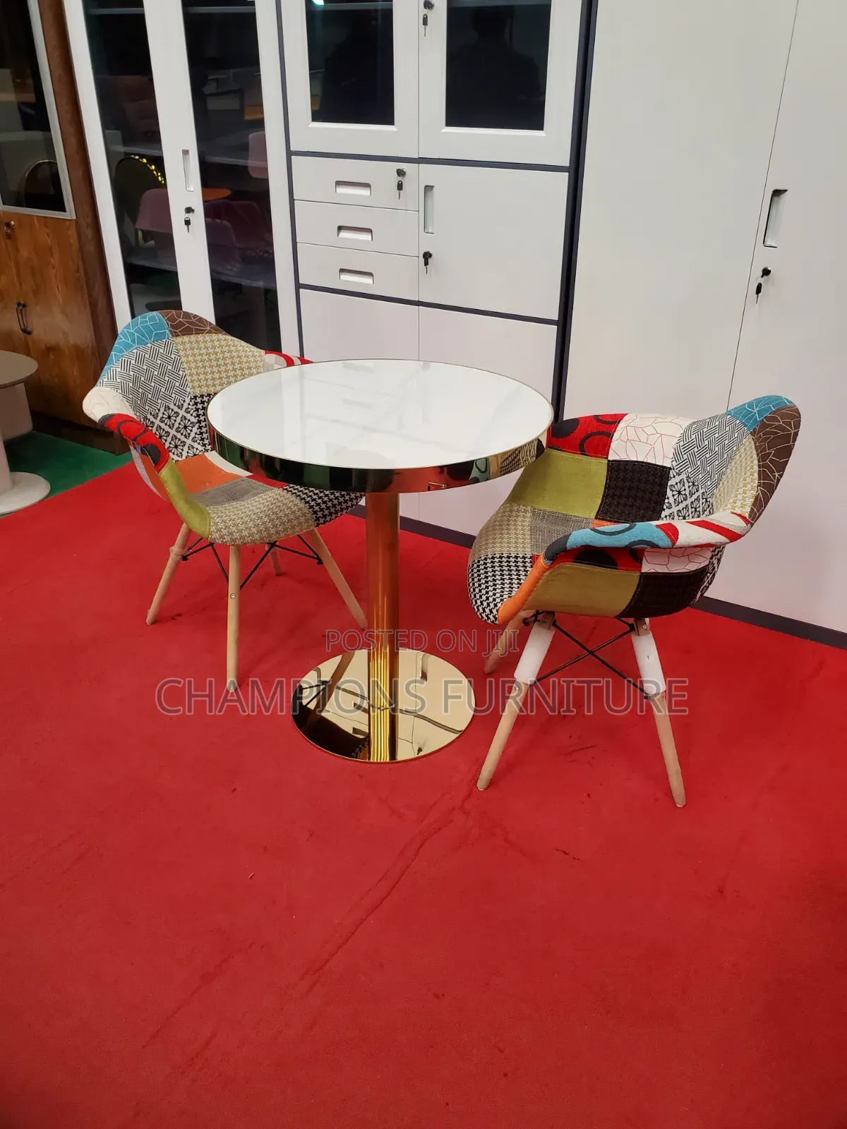 Gold Pedestal Table and Wide Patchwork Chairs