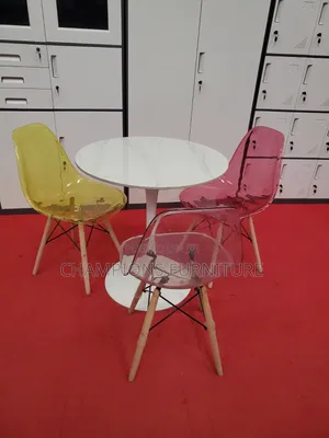 Tulip Pedestal Table and Acrylic Eames Chairs Set