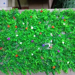 Setting the Scene With Green Boxwood Panels With Beautiful Flowers