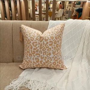 Turn an Ordinary Sofa Into a Statement Piece With Cute Throw Pillows