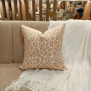 Turn an Ordinary Sofa Into a Statement Piece With Cute Throw Pillows
